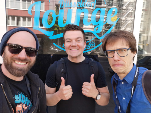 Selfie of Daniel Wentsch, me and Oliver Schöndorfer in front of a bar that uses the Lobster font in their logo