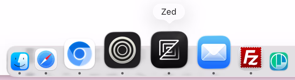 Icons in my Dock on macOS. Zen with three silver circles on a black background. Zed with three silver rectangles crossed by a line.